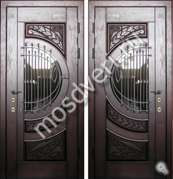 Элитная дверь с отделкой виноритом со стеклом и художественной ковкой - купить от производителя Мосдвери Элитная дверь с отделкой виноритом со стеклом и художественной ковкой